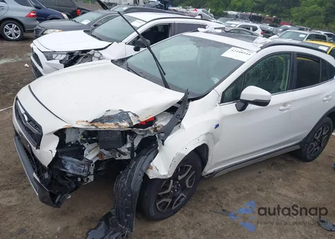 2020 Subaru Crosstrek Hybrid from USA, damaged, VIN JF2GTDNC7LH283584